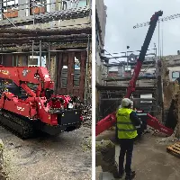 La minigrúa araña ayuda a demoler edificios